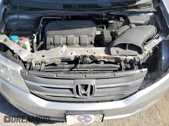 2013 Honda Odyssey EX-L with VIN 5FNRL5H69DB080586, listed as a Copart auction lot 52103685 with 166,643 mi miles and Salvage Title. Bid and sale history available at carsss.com. Image 12.