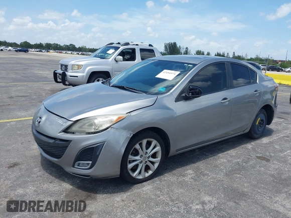 2011 Mazda 3 S Grand Touring z VIN JM1BL1W55B1474676, wystawiony jako IAAI lot #42494974 z przebiegiem 162 285 mil mil oraz . Historia ofert i sprzedaży dostępna na DreamBid. Obrazek 2.