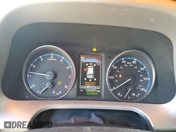 2018 Toyota RAV4 XLE with VIN 2T3WFREVXJW427748, listed as a Copart auction lot 61833055 with 104,057 mi miles and Salvage title. Bid and sale history available at DreamBid. Image 9.
