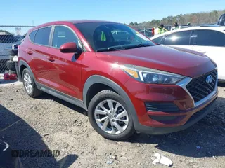 2019 Hyundai Tucson SE with VIN KM8J23A45KU931585, listed as a IAAI auction lot 41797137 with 101,559 mi miles. Bid and sale history available at carsss.com. Image 1.