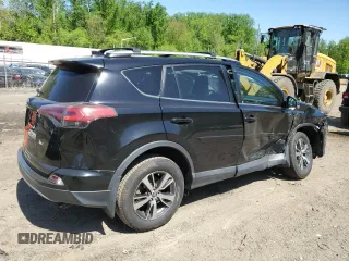 2018 Toyota RAV4 XLE with VIN 2T3WFREVXJW471443, listed as a Copart auction lot 54890655 with 131,677 mi miles and Salvage title. Bid and sale history available at DreamBid. Image 3.