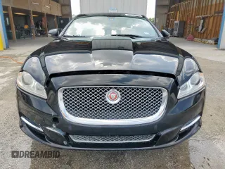2014 Jaguar XJ Portfolio with VIN SAJWA2GZ2E8V64993, listed as a Copart auction lot 88774965 with 78,689 mi miles and Salvage title. Bid and sale history available at DreamBid. Image 5.