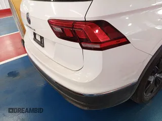 2024 Volkswagen Tiguan SE z VIN 3VV3B7AX0RM082514, wystawiony jako IAAI lot #42796136 z przebiegiem 27 247 mil mil oraz . Historia ofert i sprzedaży dostępna na DreamBid. Obrazek 8.