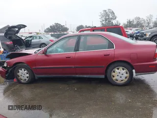 1996 Honda Accord LX with VIN 1HGCD5639TA011773, listed as a IAAI auction lot 41583086 with 148,439 mi miles and . Bid and sale history available at carsss.com. Image 14.