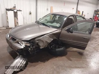 2002 Pontiac Grand Am SE1 with VIN 1G2NF52FX2C128240, listed as a IAAI auction lot 41356415 with 15,900 mi miles. Bid and sale history available at carsss.com. Image 2.