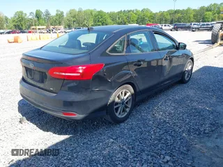2016 Ford Focus SE with VIN 1FADP3F26GL285390, listed as a IAAI auction lot 42036840 with 228,425 mi miles. Bid and sale history available at carsss.com. Image 4.