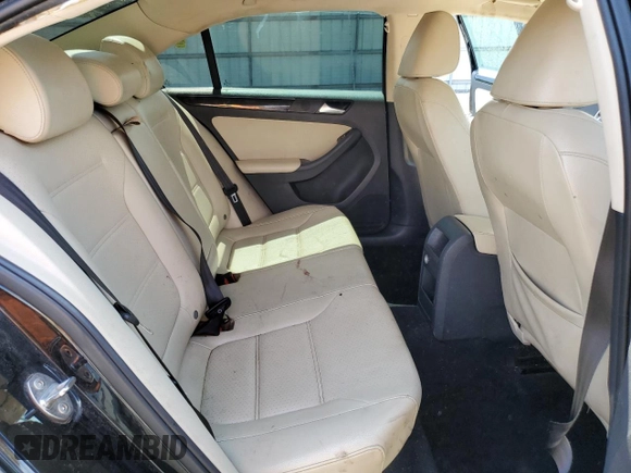 2017 Volkswagen Jetta SEL z VIN 3VWL17AJ6HM404789, wystawiony jako Copart lot #59029645 z przebiegiem 129 788 mil mil oraz Szkoda całkowita • Salvage title. Historia ofert i sprzedaży dostępna na DreamBid. Obrazek 10.
