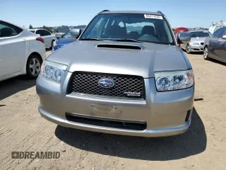 2007 Subaru Forester Special Sports XT z VIN JF1SG69637H737807, wystawiony jako Copart lot #60371035 z przebiegiem 102 086 mil mil oraz Czysty tytuł • Clean title. Historia ofert i sprzedaży dostępna na DreamBid. Obrazek 5.