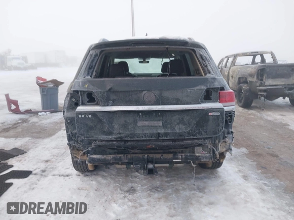 2021 Volkswagen Atlas SE with VIN 1V2HR2CA9MC574558, listed as a IAAI auction lot 41296583 with 50,267 mi miles and . Bid and sale history available at DreamBid. Image 6.