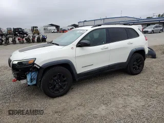 2019 Jeep Cherokee Trailhawk z VIN 1C4PJMBX0KD127324, wystawiony jako Copart lot #50821445 z przebiegiem 88 604 mil mil oraz Szkoda całkowita • Salvage title. Historia ofert i sprzedaży dostępna na DreamBid. Obrazek 1.