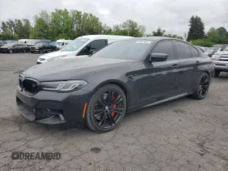 2022 BMW M5 z VIN WBS83CH03NCJ01385, wystawiony jako Copart lot #68961034 z przebiegiem 25 932 mil mil oraz Szkoda całkowita • Salvage title. Historia ofert i sprzedaży dostępna na DreamBid. Obrazek 1.