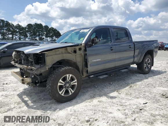 2015 Toyota Tacoma with VIN 3TMMU4FN1FM073755, listed as a Copart auction lot 59657105 with 114,193 mi miles and Salvage title. Bid and sale history available at DreamBid. Image 1.