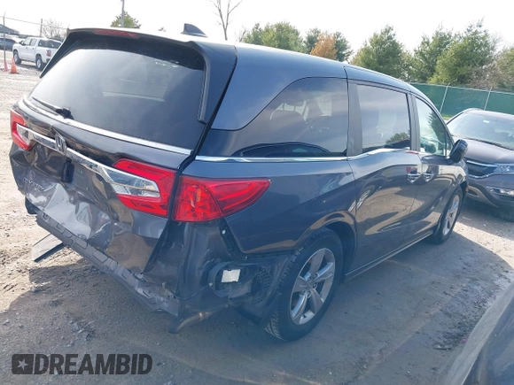 2018 Honda Odyssey EX-L with VIN 5FNRL6H77JB101803, listed as a IAAI auction lot 41927622 with 147,587 mi miles. Bid and sale history available at carsss.com. Image 4.