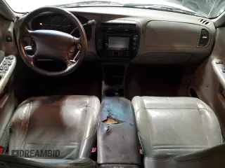 2000 Ford Explorer XLT с VIN 1FMZU83PXYZA51396, выставлен на аукционе Copart как лот 62365505 с пробегом 230 018 миль миль и Списание • Salvage title. История ставок и продаж доступна на DreamBid. Изображение 8.