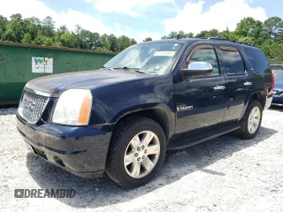 2009 GMC Yukon SLT 4SB z VIN 1GKFC330X9J120995, wystawiony jako Copart lot #61252905 z przebiegiem 102 573 mil mil oraz Czysty tytuł • Clean title. Historia ofert i sprzedaży dostępna na DreamBid. Obrazek 1.