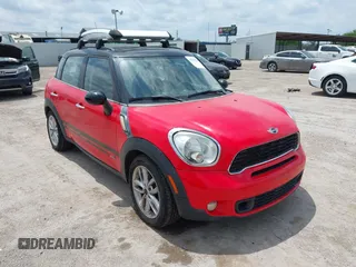 2011 MINI Countryman S z VIN WMWZC5C52BWL53856, wystawiony jako IAAI lot #42368316 z przebiegiem 107 318 mil mil oraz . Historia ofert i sprzedaży dostępna na DreamBid. Obrazek 1.