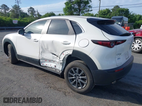 2023 Mazda CX-30 S with VIN 3MVDMBAM8PM545288, listed as a IAAI auction lot 42198433 with 19,609 mi miles and . Bid and sale history available at DreamBid. Image 3.