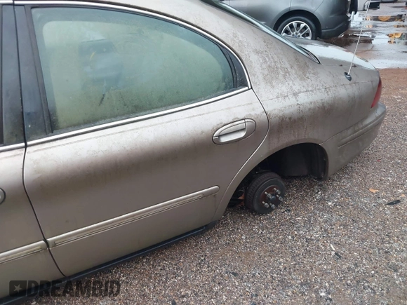 2002 Mercury Sable GS z VIN 1MEFM50U82A647899, wystawiony jako IAAI lot #42193511 z przebiegiem 130 254 mil mil oraz . Historia ofert i sprzedaży dostępna na DreamBid. Obrazek 6.