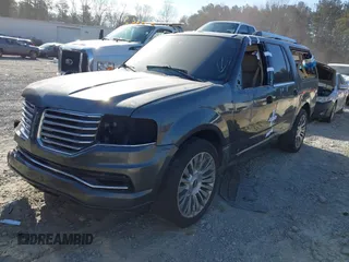 2015 Lincoln Navigator z VIN 5LMJJ3JT3FEJ09214, wystawiony jako IAAI lot #41682213 z przebiegiem 133 997 mil mil oraz . Historia ofert i sprzedaży dostępna na DreamBid. Obrazek 2.