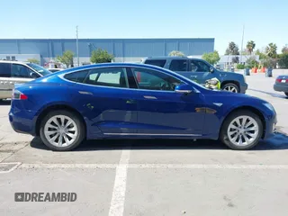 2016 Tesla Model S 90D with VIN 5YJSA1E25GF157220, listed as a IAAI auction lot 42003019 with 130,540 mi miles and . Bid and sale history available at DreamBid. Image 13.