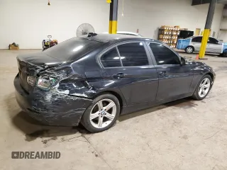 2013 BMW 3 Series 320i with VIN WBA3B1C5XDK130167, listed as a Copart auction lot 60518965 with 129,308 mi miles and Salvage title. Bid and sale history available at DreamBid. Image 3.