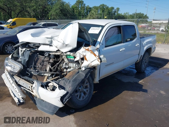 2017 Toyota Tacoma SR5 with VIN 5TFAZ5CNXHX044976, listed as a IAAI auction lot 42052922 with 149,116 mi miles and . Bid and sale history available at DreamBid. Image 2.