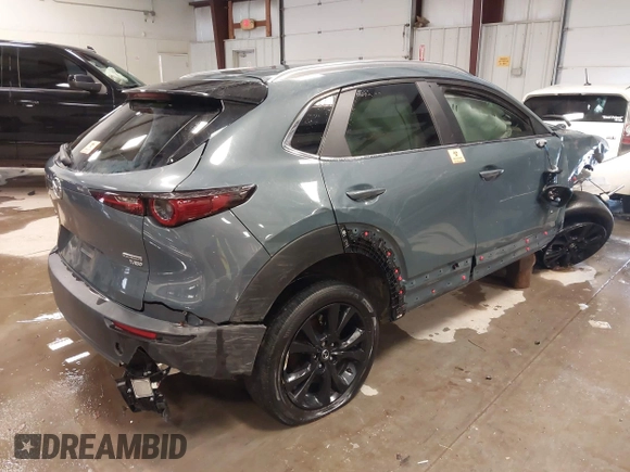 2022 Mazda CX-30 2.5 Turbo with VIN 3MVDMBAY6NM430673, listed as a IAAI auction lot 41278769 with Not Provided miles and . Bid and sale history available at DreamBid. Image 4.