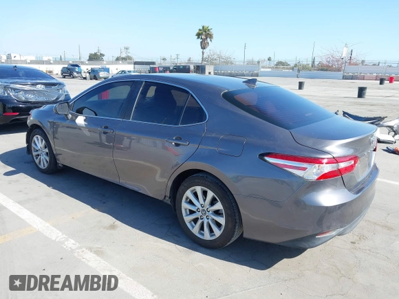 2019 Toyota Camry LE with VIN 4T1B11HK2KU240465, listed as a IAAI auction lot 42095075 with 67,852 mi miles and . Bid and sale history available at DreamBid. Image 3.