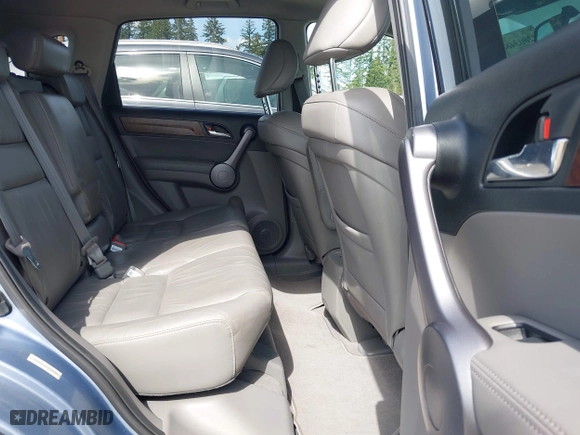 2009 Honda CR-V EX-L with VIN JHLRE48739C009761, listed as a IAAI auction lot 42003486 with 94,971 mi miles. Bid and sale history available at carsss.com. Image 8.