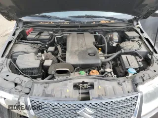 2012 Suzuki Grand Vitara Limited z VIN JS3TD0D74C4100965, wystawiony jako Copart lot #52727894 z przebiegiem 150 760 mil mil oraz Szkoda całkowita • Salvage title. Historia ofert i sprzedaży dostępna na DreamBid. Obrazek 12.