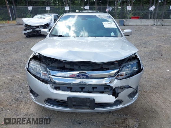 2012 Ford Fusion Hybrid with VIN 3FADP0L35CR440051, listed as a IAAI auction lot 42644284 with 89,087 mi miles and . Bid and sale history available at DreamBid. Image 12.