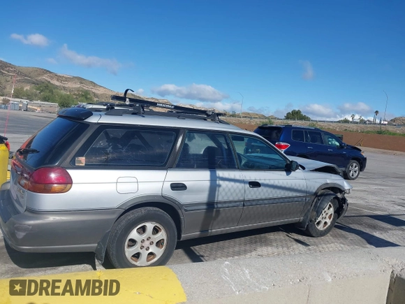 1999 Subaru Legacy Outback z VIN 4S3BG6850X6621723, wystawiony jako IAAI lot #41932992 z przebiegiem 283 200 mil mil oraz . Historia ofert i sprzedaży dostępna na DreamBid. Obrazek 13.