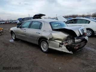 2001 Lincoln Town Car Executive with VIN 1LNHM81W81Y700002, listed as a Copart auction lot 47018365 with 129,456 mi miles and Salvage Title. Bid and sale history available at carsss.com. Image 2.