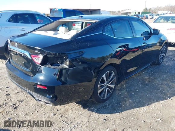 2019 Nissan Maxima Platinum z VIN 1N4AA6AV0KC379524, wystawiony jako IAAI lot #40862758 z przebiegiem 74 145 mil mil oraz . Historia ofert i sprzedaży dostępna na DreamBid. Obrazek 4.