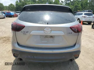 2014 Mazda CX-5 Sport with VIN JM3KE2BE2E0349755, listed as a Copart auction lot 58212375 with Not provided miles and Clean title. Bid and sale history available at DreamBid. Image 6.