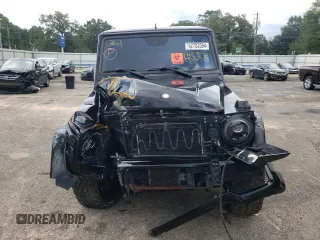 2014 Mercedes-Benz G-Class G 550 with VIN WDCYC3HF2EX214663, listed as a Copart auction lot 62703594 with 104,644 mi miles and Salvage Title. Bid and sale history available at carsss.com. Image 5.