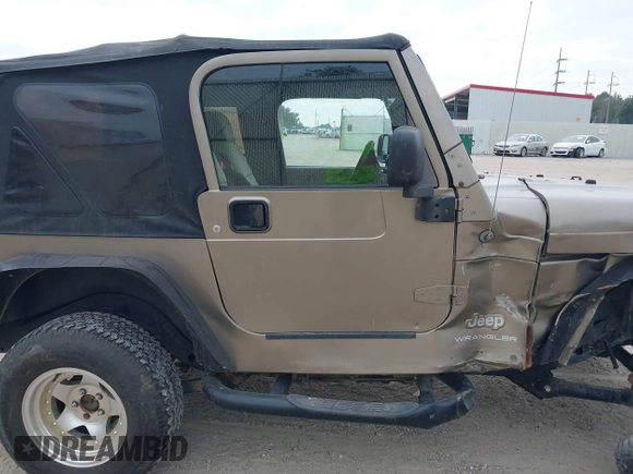 2003 Jeep Wrangler SE with VIN 1J4FA29113P304250, listed as a IAAI auction lot 40917099 with 191,589 mi miles. Bid and sale history available at carsss.com. Image 13.