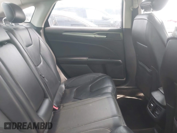 2016 Ford Fusion Titanium with VIN 3FA6P0K99GR317034, listed as a IAAI auction lot 42590288 with 200,468 mi miles and . Bid and sale history available at DreamBid. Image 8.