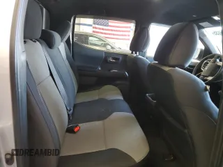2023 Toyota Tacoma SR5 z VIN 3TMDZ5BNXPM165719, wystawiony jako Copart lot #58256035 z przebiegiem 13 681 mil mil oraz Szkoda całkowita • Salvage title. Historia ofert i sprzedaży dostępna na DreamBid. Obrazek 10.