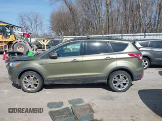 2013 Ford Escape SEL с VIN 1FMCU9HX4DUC34174, выставлен на аукционе IAAI как лот 41781517 с пробегом Не указан миль и . История ставок и продаж доступна на DreamBid. Изображение 14.