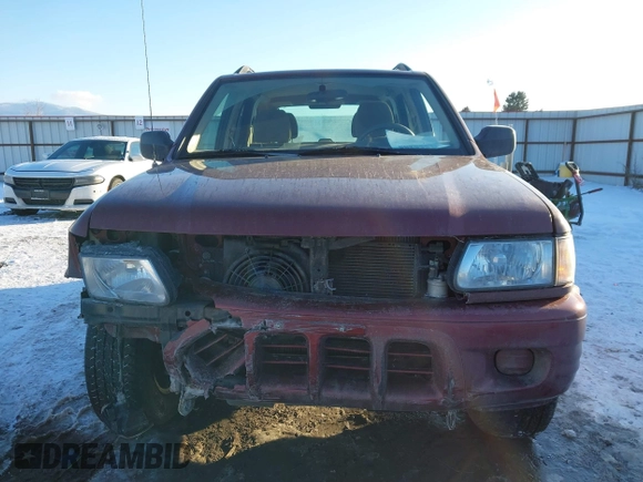 2002 Isuzu Rodeo z VIN 4S2DM58W124319936, wystawiony jako IAAI lot #41555285 z przebiegiem 143 035 mil mil oraz . Historia ofert i sprzedaży dostępna na DreamBid. Obrazek 12.