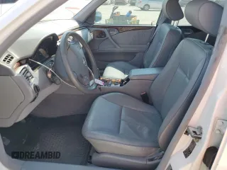 2000 Mercedes-Benz E-Class with VIN WDBJF65J5YB054237, listed as a Copart auction lot 76315974 with 95,092 mi miles and Salvage Title. Bid and sale history available at carsss.com. Image 7.