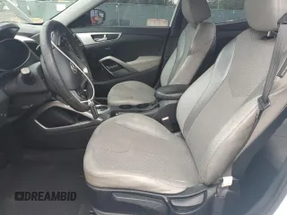2012 Hyundai Veloster w/Black Int z VIN KMHTC6AD1CU030478, wystawiony jako Copart lot #62715005 z przebiegiem 127 625 mil mil oraz Szkoda całkowita • Salvage title. Historia ofert i sprzedaży dostępna na DreamBid. Obrazek 7.