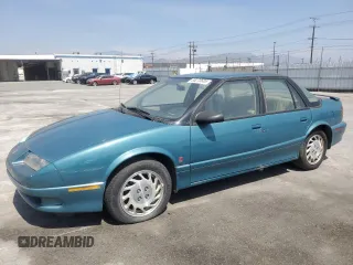 1994 Saturn SL z VIN 1G8ZK5571RZ301061, wystawiony jako Copart lot #55270685 z przebiegiem 31 990 mil mil oraz Czysty tytuł • Clean title. Historia ofert i sprzedaży dostępna na DreamBid. Obrazek 1.