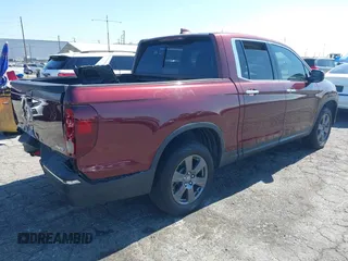 2020 Honda Ridgeline RTL-E with VIN 5FPYK3F7XLB014875, listed as a IAAI auction lot 42620537 with 41,919 mi miles and . Bid and sale history available at DreamBid. Image 4.