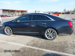 2013 Cadillac XTS Premium with VIN 2G61T5S32D9237829, listed as a IAAI auction lot 41863539 with 149,661 mi miles. Bid and sale history available at carsss.com. Image 14.