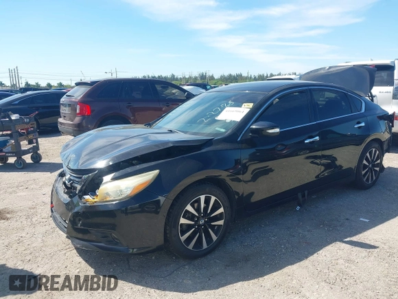 2018 Nissan Altima S with VIN 1N4AL3AP8JC109000, listed as a IAAI auction lot 41669061 with 238,560 mi miles and . Bid and sale history available at DreamBid. Image 17.