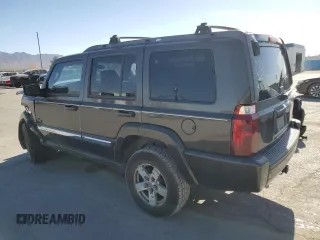 2006 Jeep Commander with VIN 1J8HH48K26C263986, listed as a Copart auction lot 84712294 with 216,923 mi miles and Salvage title. Bid and sale history available at DreamBid. Image 2.