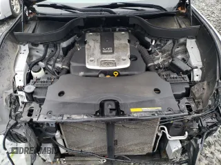 2017 Infiniti QX70 z VIN JN8CS1MW5HM414492, wystawiony jako Copart lot #52415495 z przebiegiem 123 095 mil mil oraz Szkoda całkowita • Salvage title. Historia ofert i sprzedaży dostępna na DreamBid. Obrazek 12.