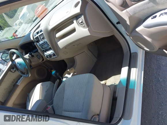 2006 Kia Sportage LX with VIN KNDJF723567151614, listed as a IAAI auction lot 42022102 with 128,564 mi miles and . Bid and sale history available at carsss.com. Image 5.